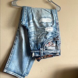 Rock Revival Blue Bootcut Jeans with Distressing